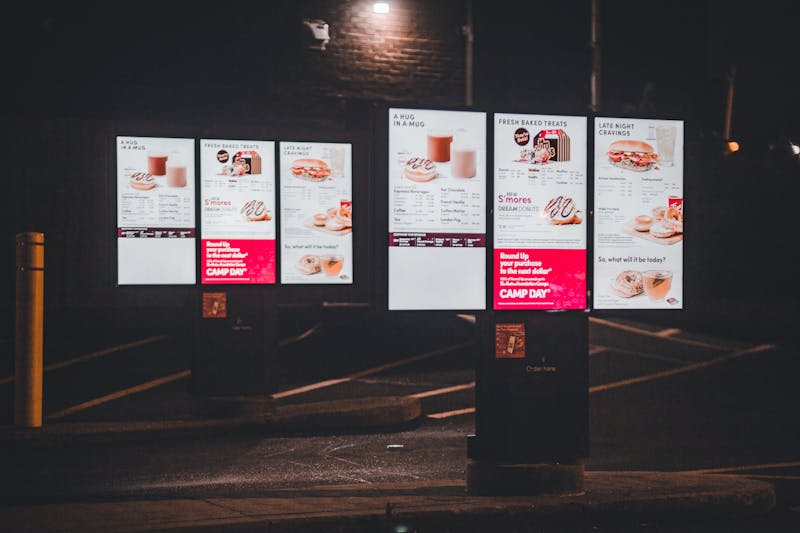 Restaurant exterior with vibrant signage and welcoming entrance