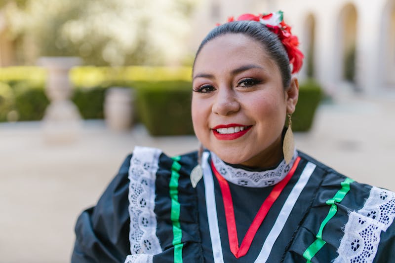 Team member preparing food with care and expertise